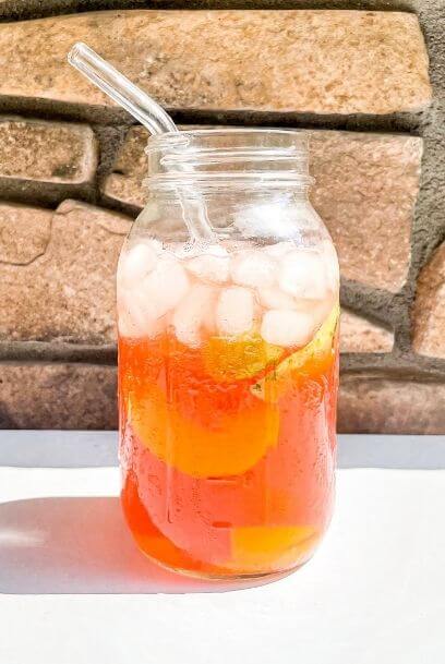 Peach Basil Fizz Mocktail a healthy hydrating summer mocktail laura live well health coaching