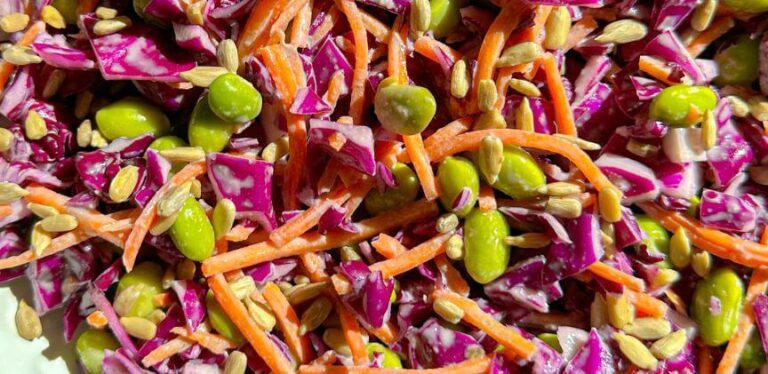 crunchy red cabbage and edamame salad with citrus tahini dressing